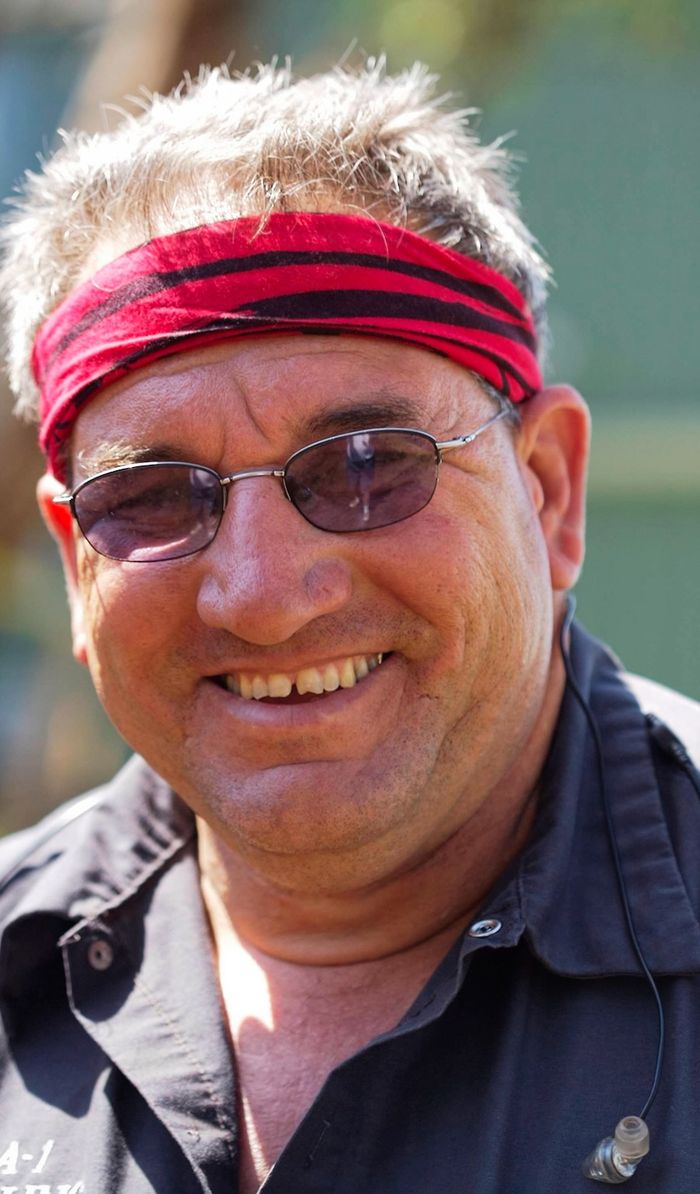 Portrait of Terry Arrighi smiling on a job site